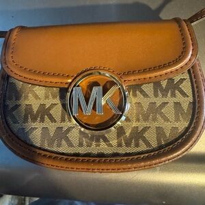Michael Kors belt and shoulder bag.